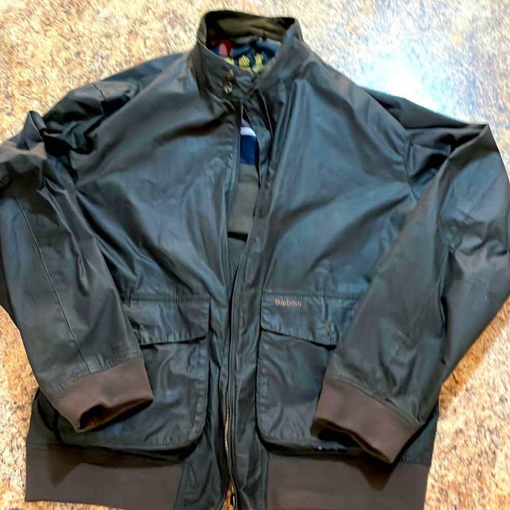 Barbour light weight class jacket has small tear in rt arm see pic